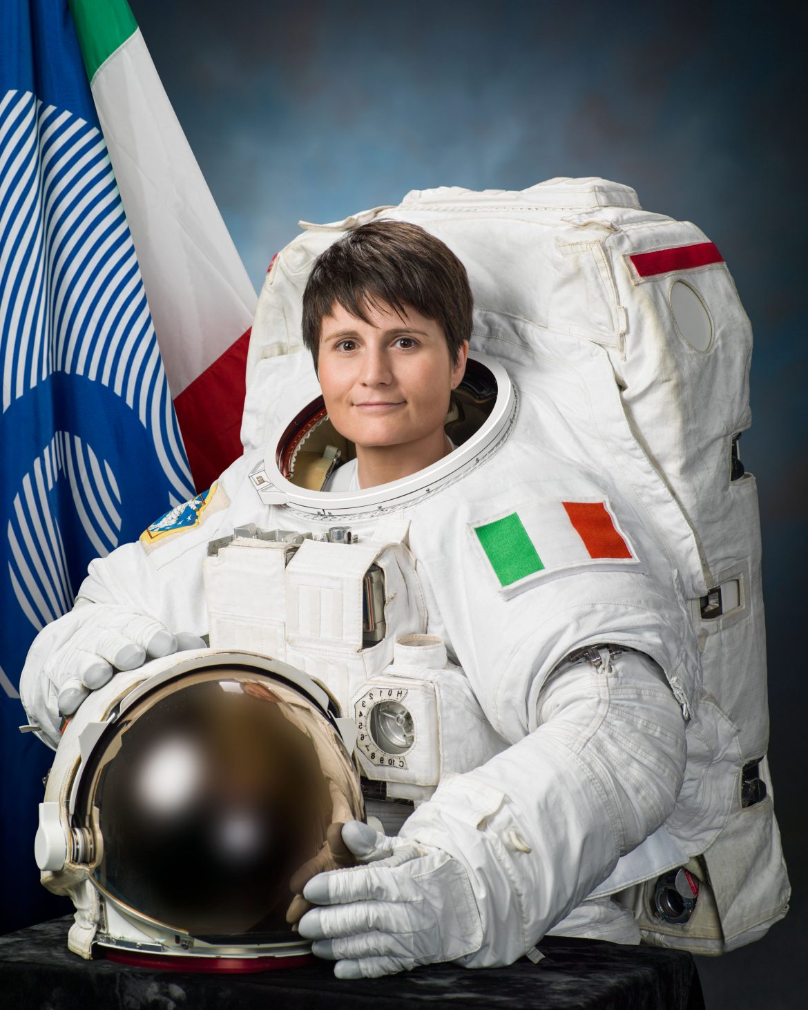 Samantha_Cristoforetti_official_portrait_in_an_EMU_spacesuit
